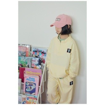 【ピーチーズ】ジュニア  キャラクターワッペンつき フロントポケット ハーフジップトレーナー